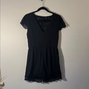 Stylish Black Romper with Lace Accents